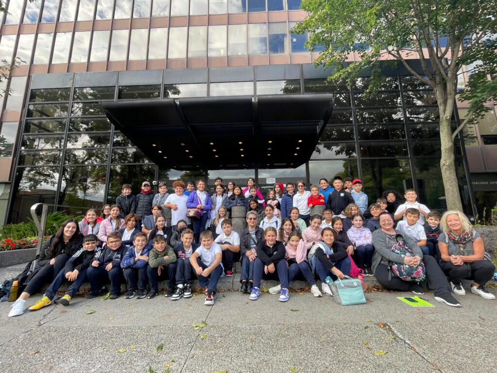 group of students in front of school